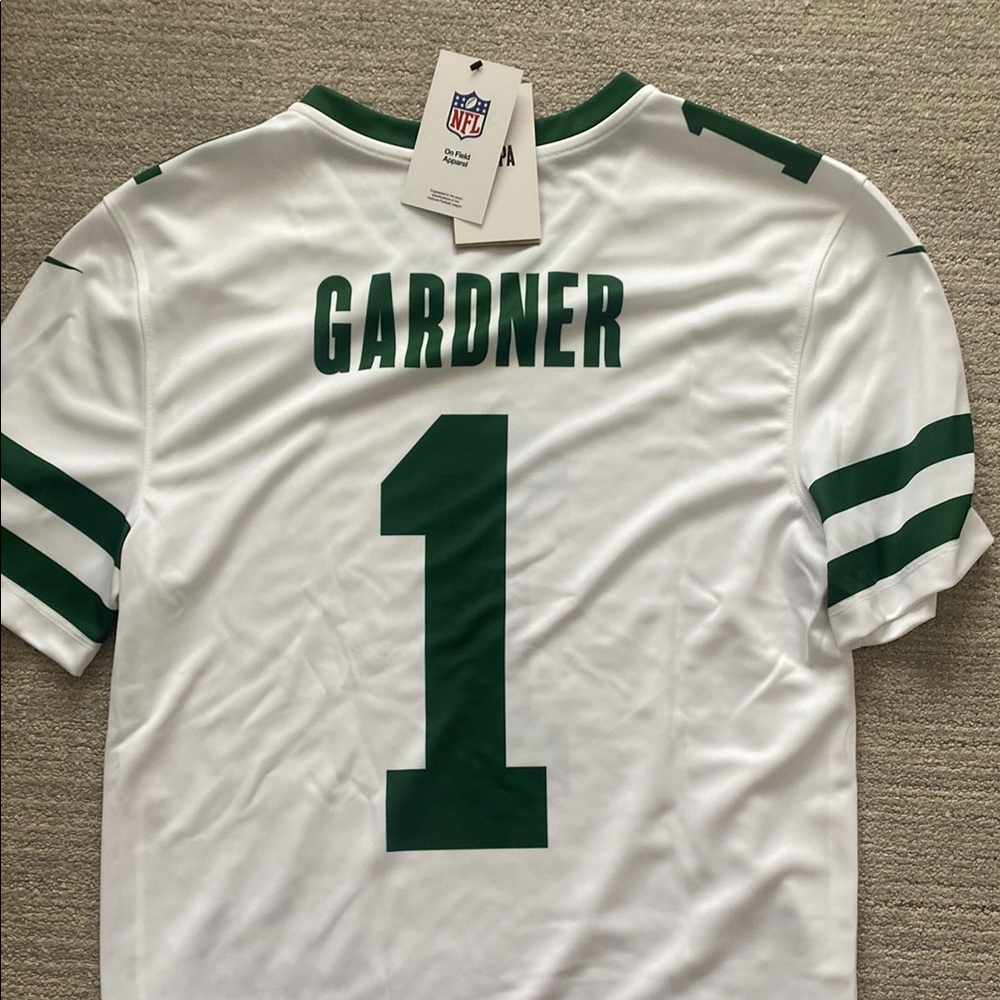 White Jersey with Green Accents